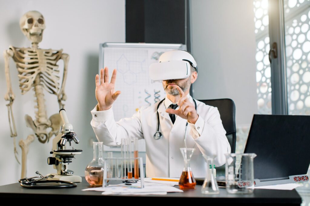 Caucasian man lab worker wearing VR goggles at work. Science technician in virtual reality glasses